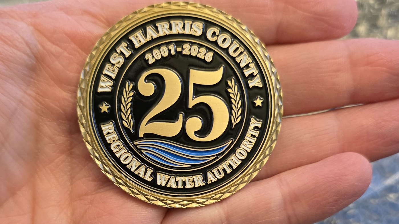 Close-up of WHCRWA 25th anniversary challenge coin